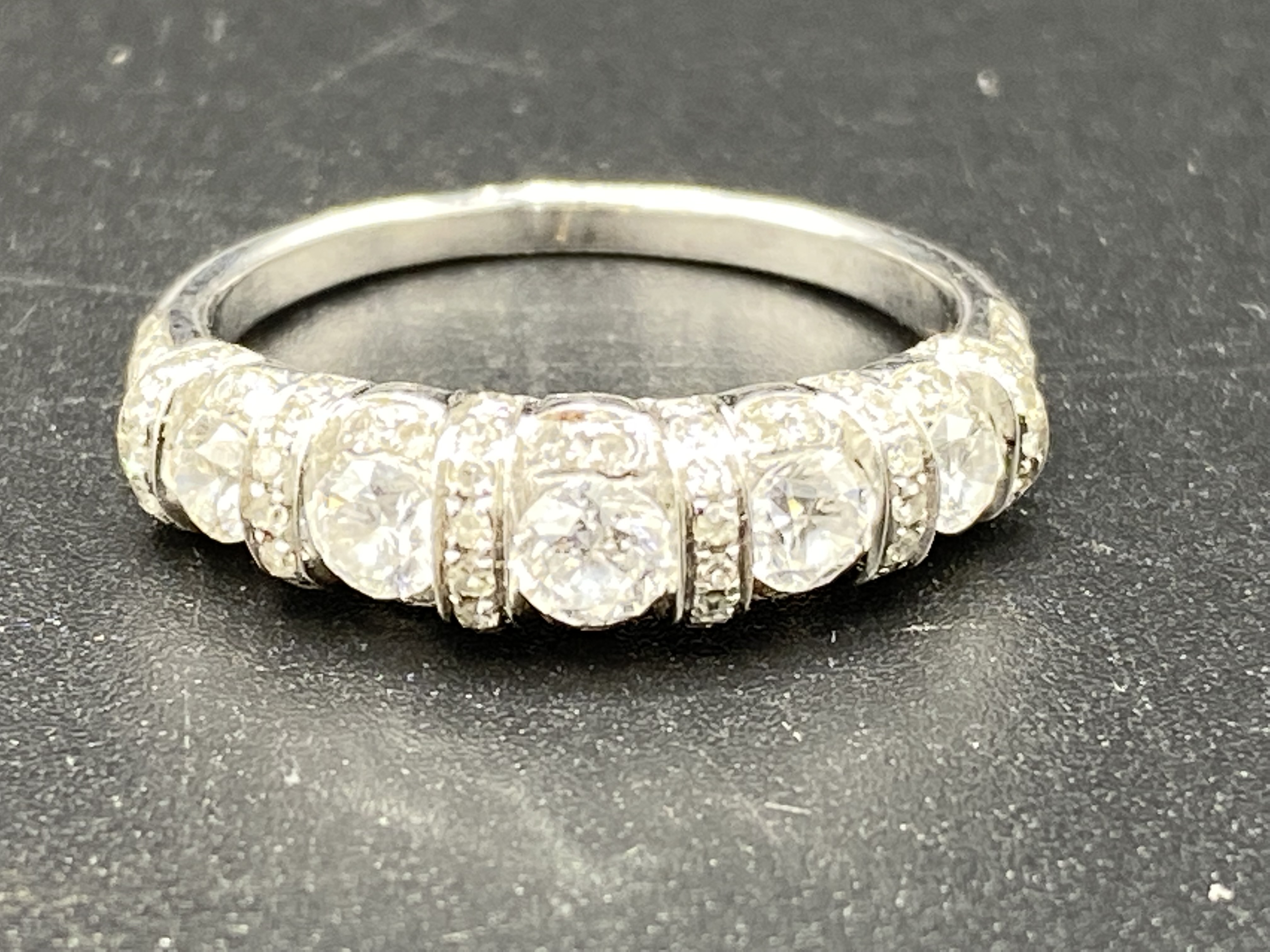 White gold ring set with five diamonds