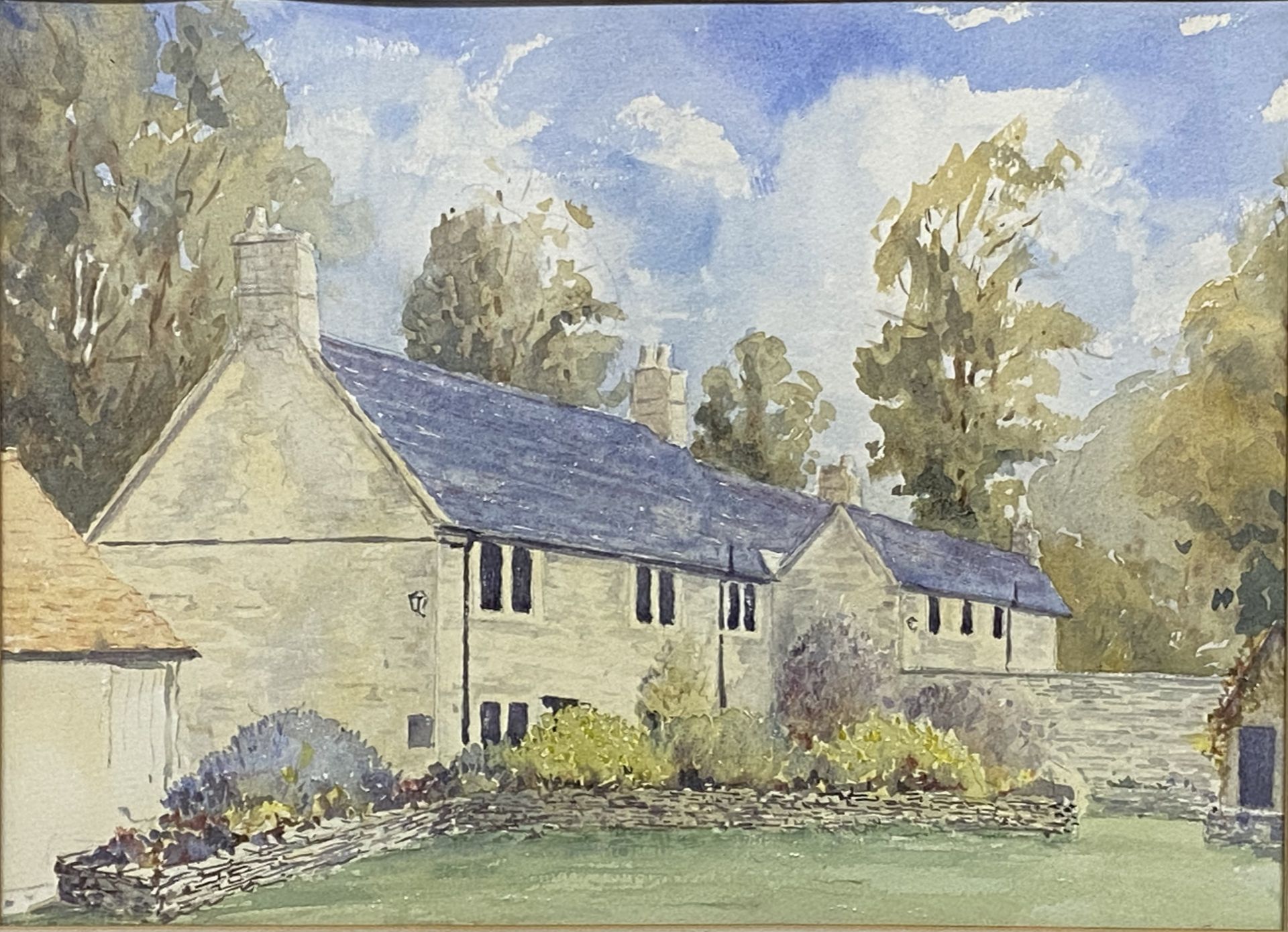 Framed and glazed watercolour of a cottage