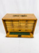 Buck and Ryan oak collectors cabinet