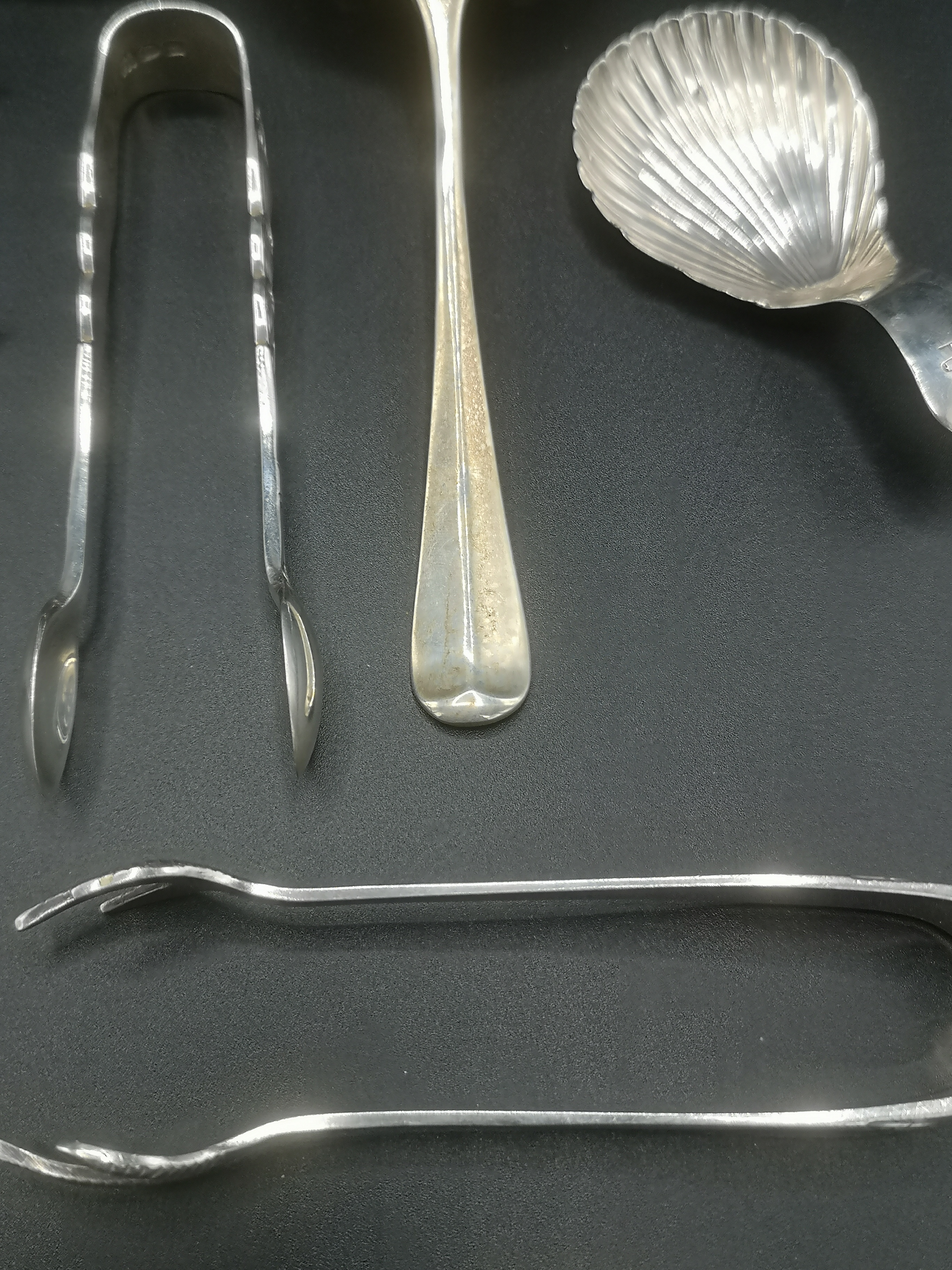 Silver tea strainer with other silver spoons together with silver plate sugar tongs - Image 9 of 10