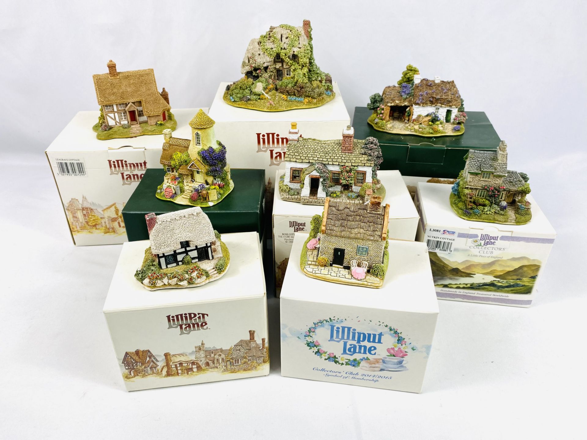 Eight Lilliput Lane Cottages in boxes