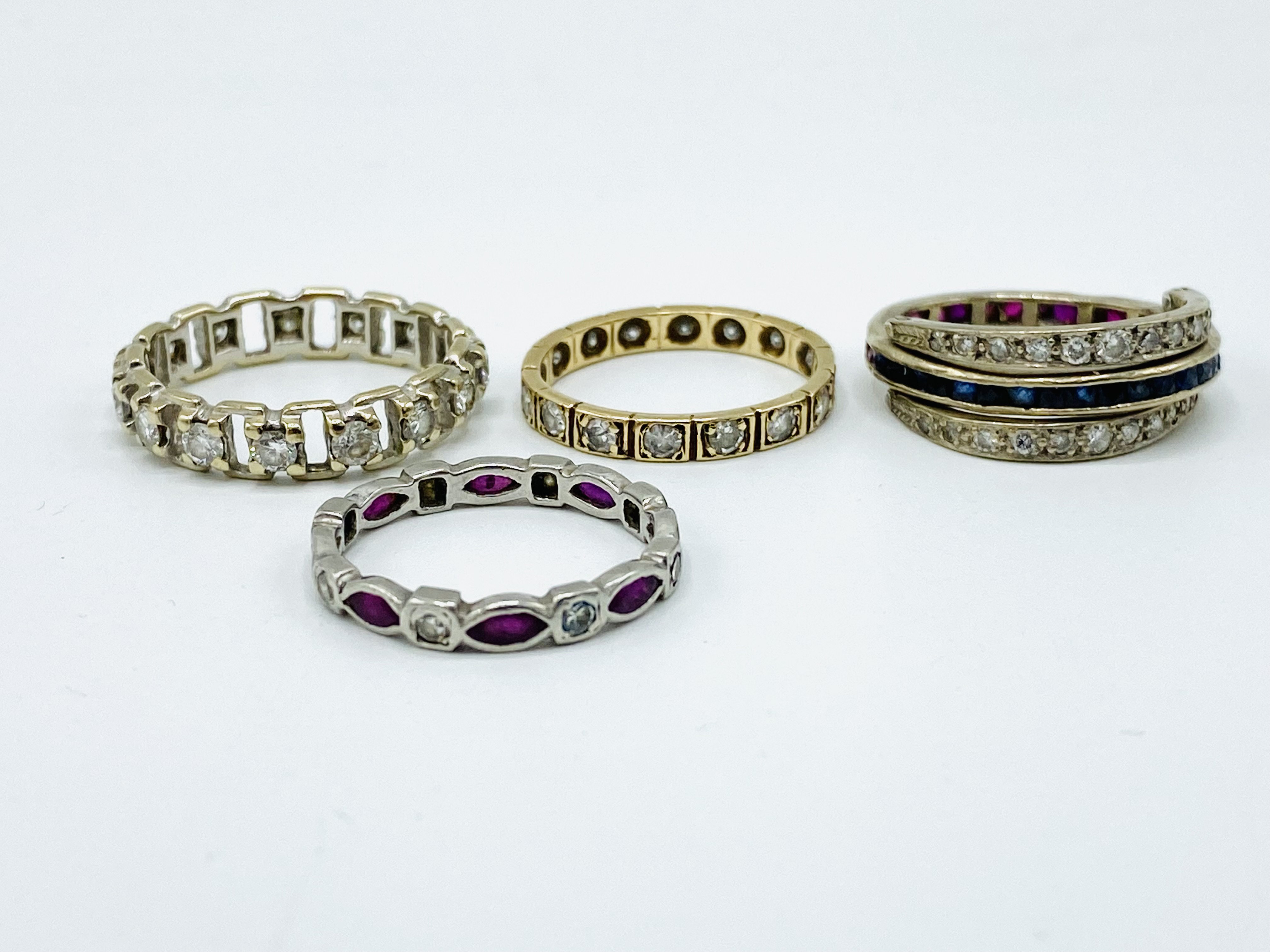 Four various diamond set bands