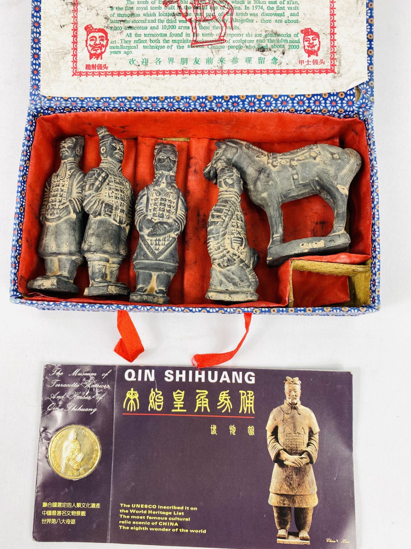 Set of five models of the terracotta army together with a commemorative coin - Image 2 of 4