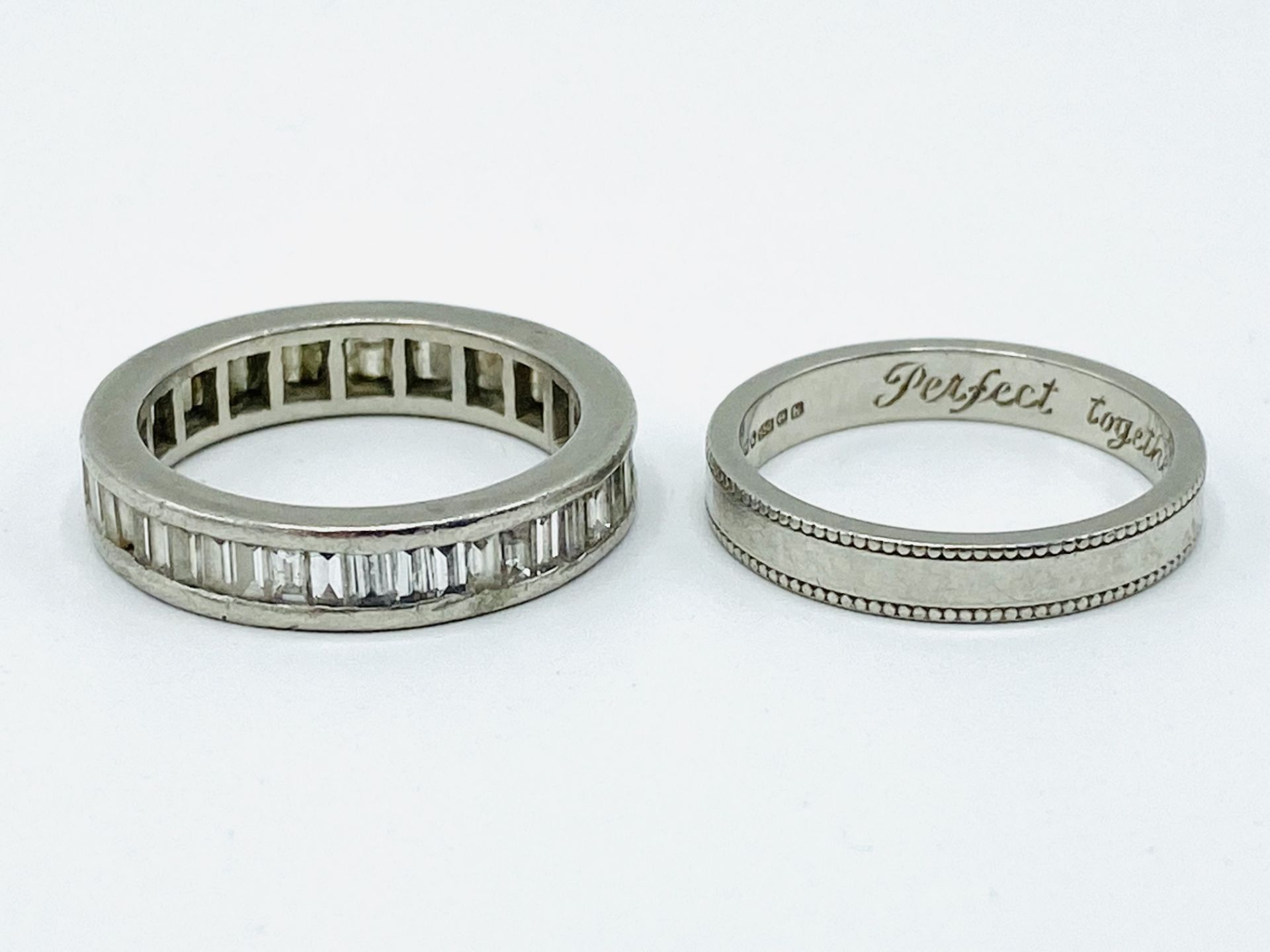 Platinum and diamond eternity ring together with a platinum band