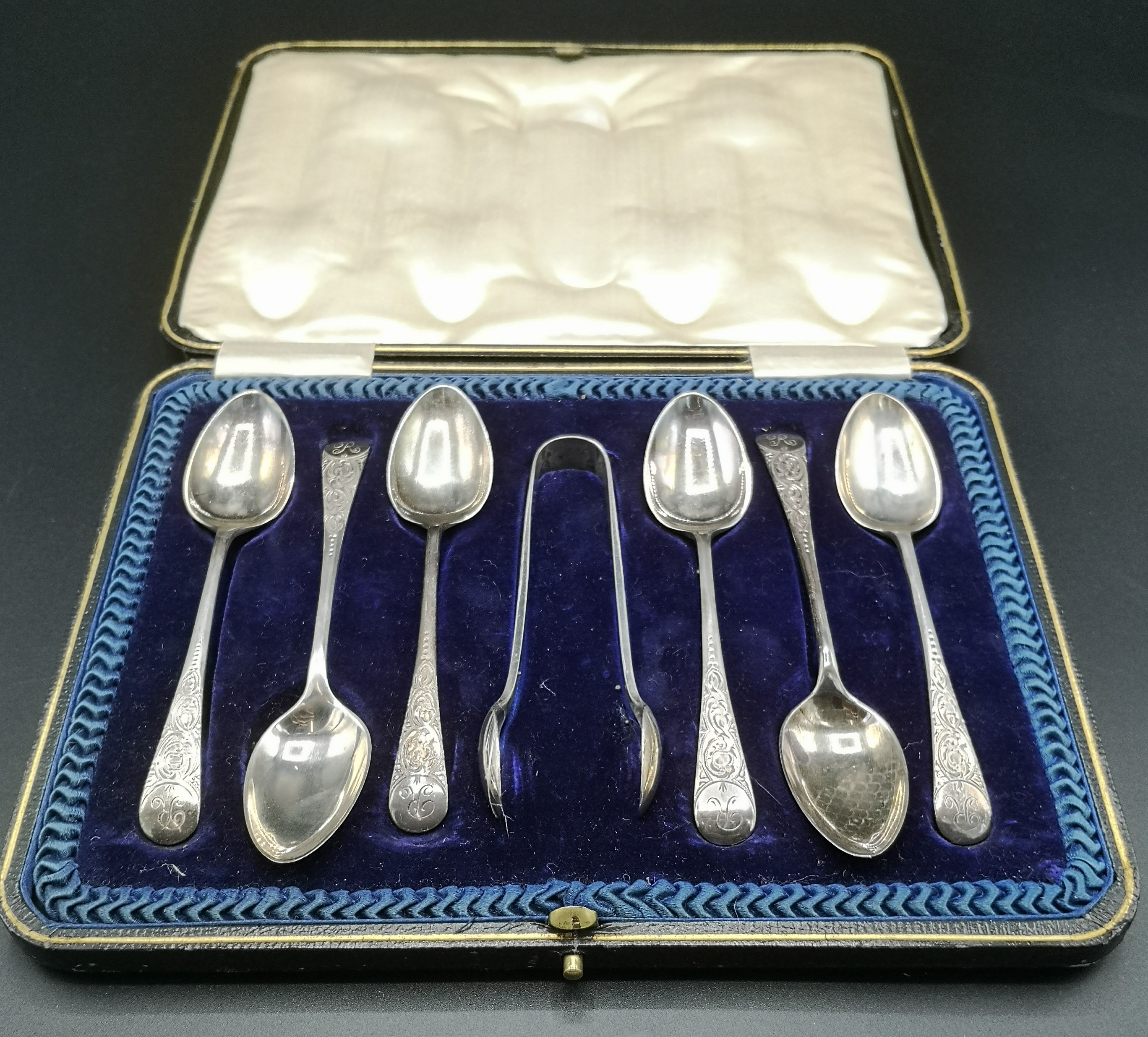 Set of six silver teaspoons and sugar tongs