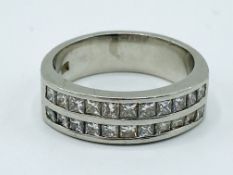 Platinum and diamond half eternity ring