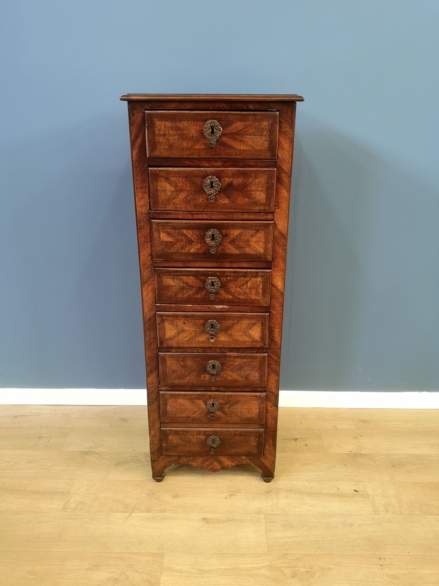 Mahogany veneer chest of eight drawers