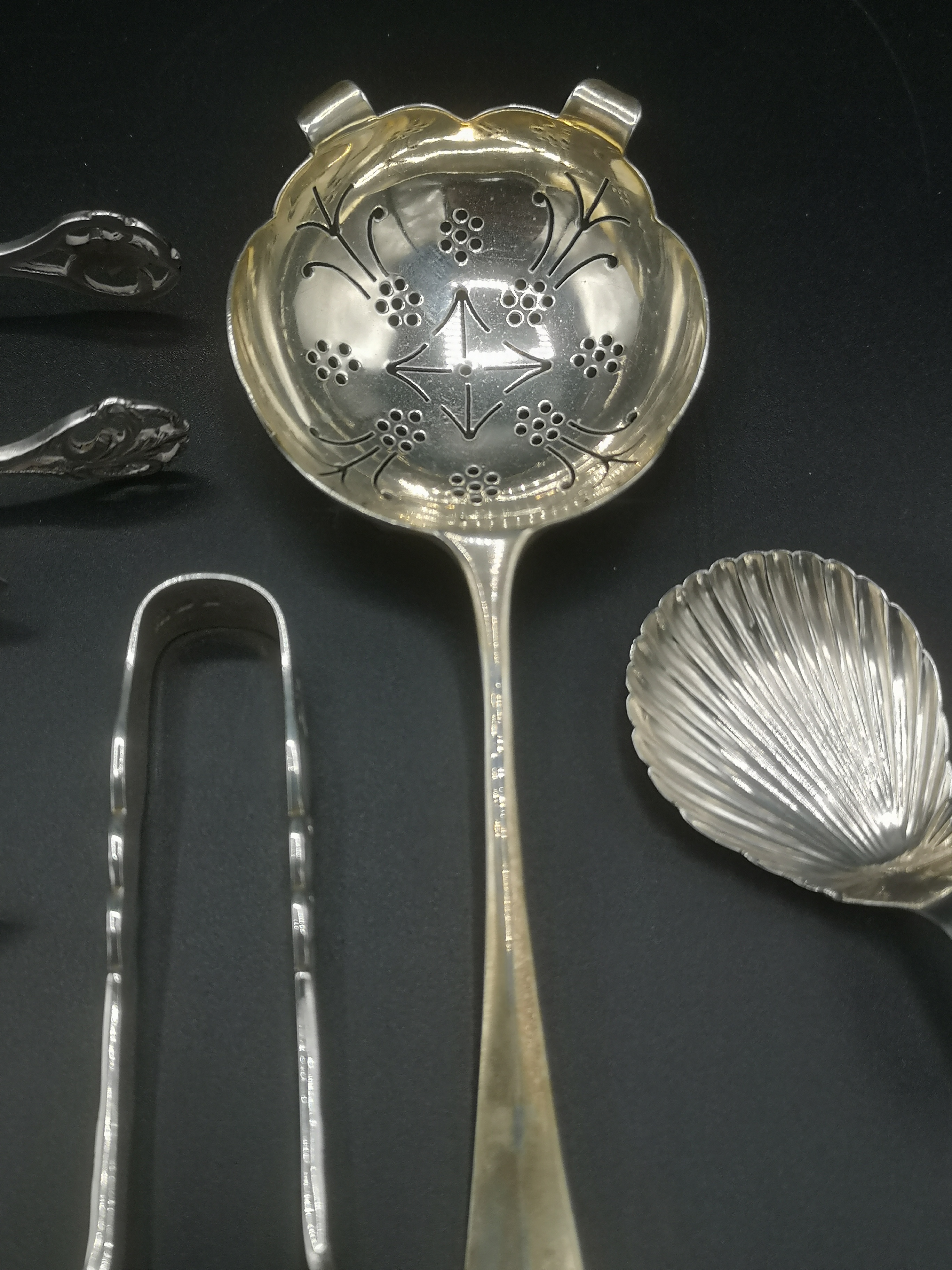Silver tea strainer with other silver spoons together with silver plate sugar tongs - Image 8 of 10