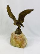 Brass eagle mounted on an onyx base