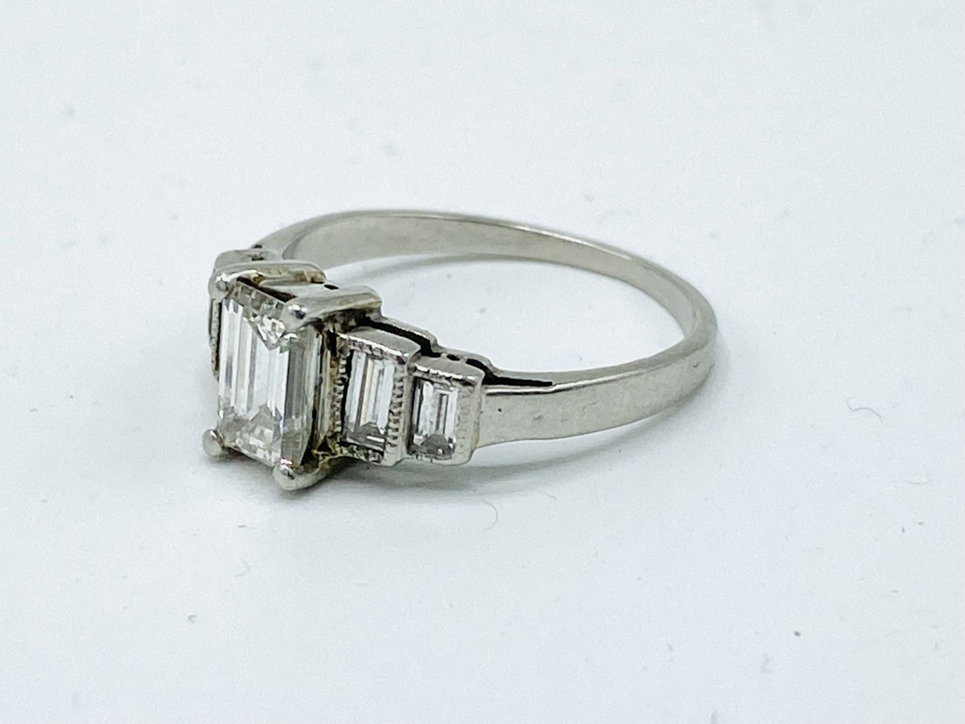 Platinum five stone emerald cut diamond ring - Image 6 of 6