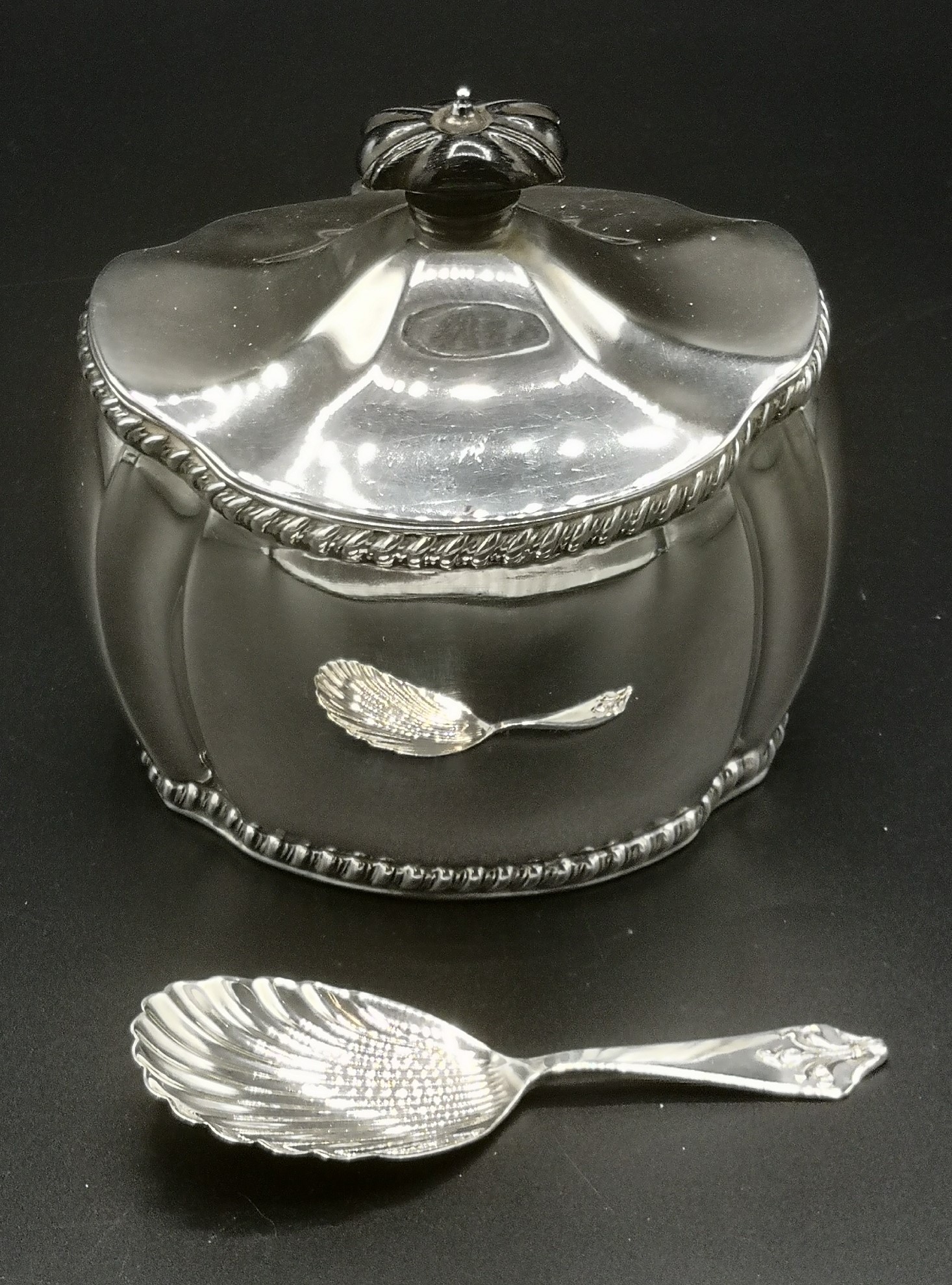 Silver tea caddy and spoon