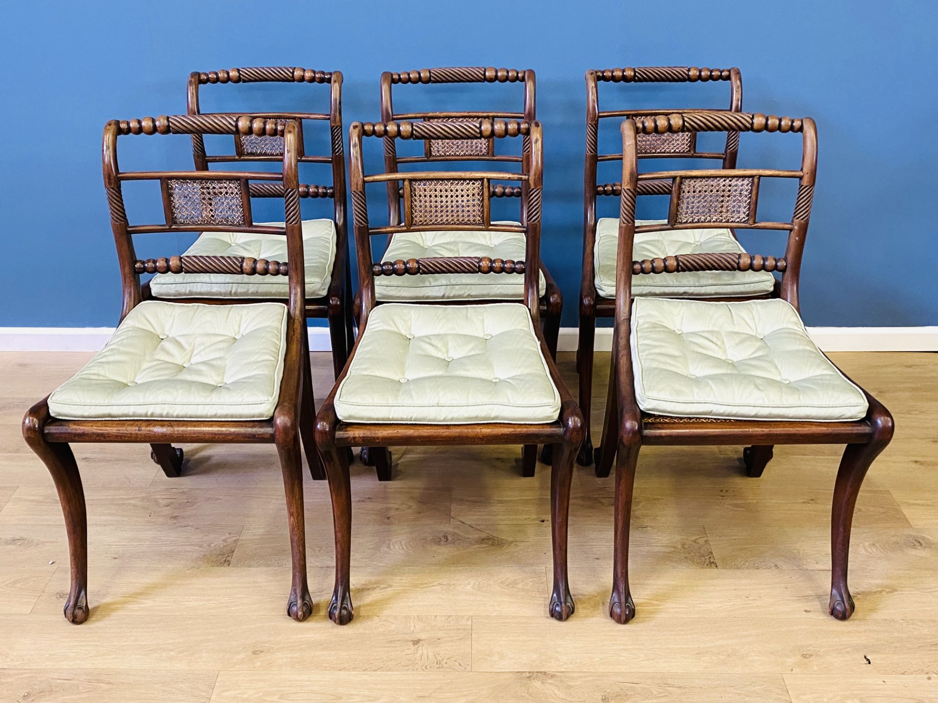 Six mahogany dining chairs