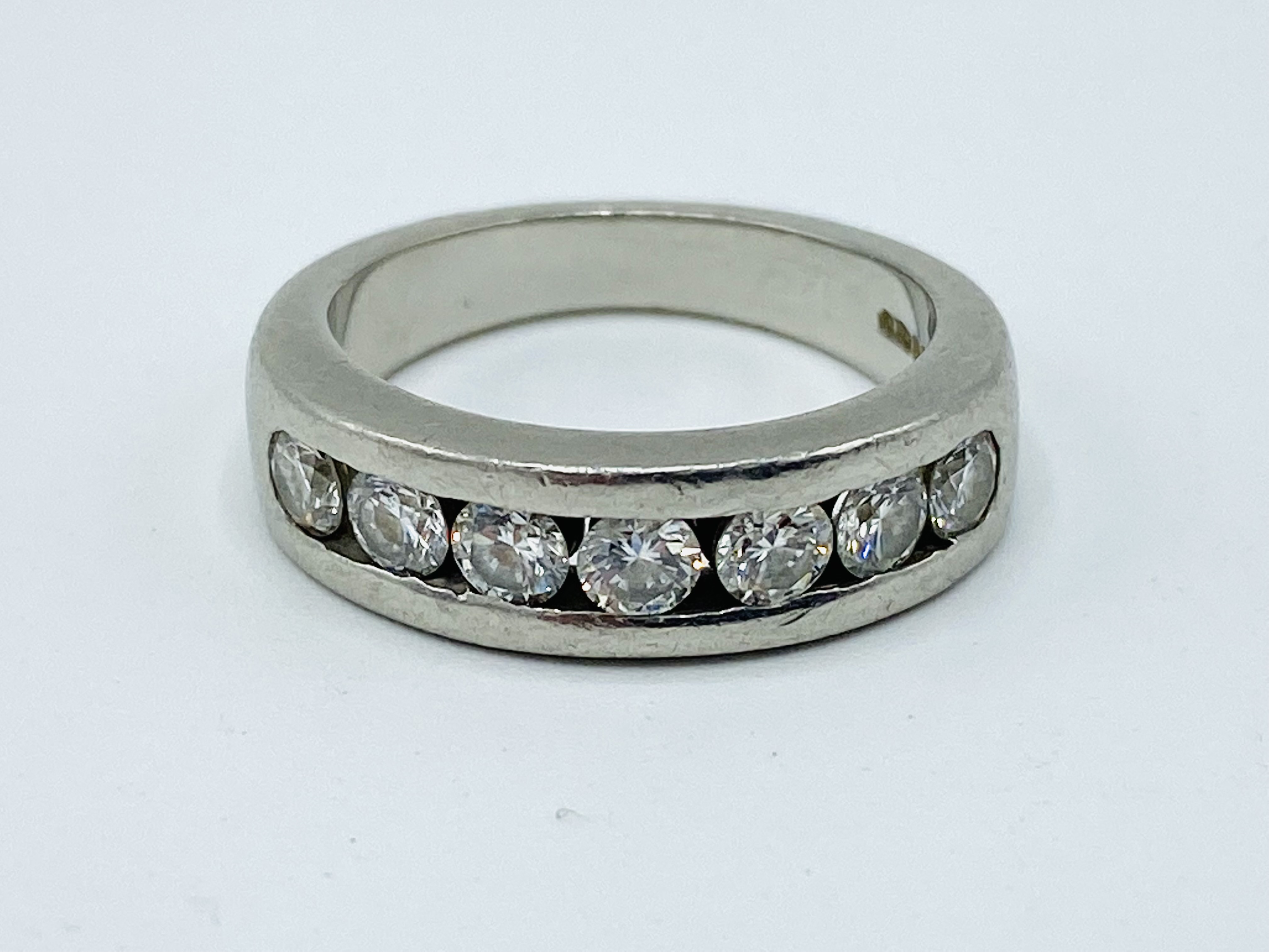 Platinum and diamond half eternity ring