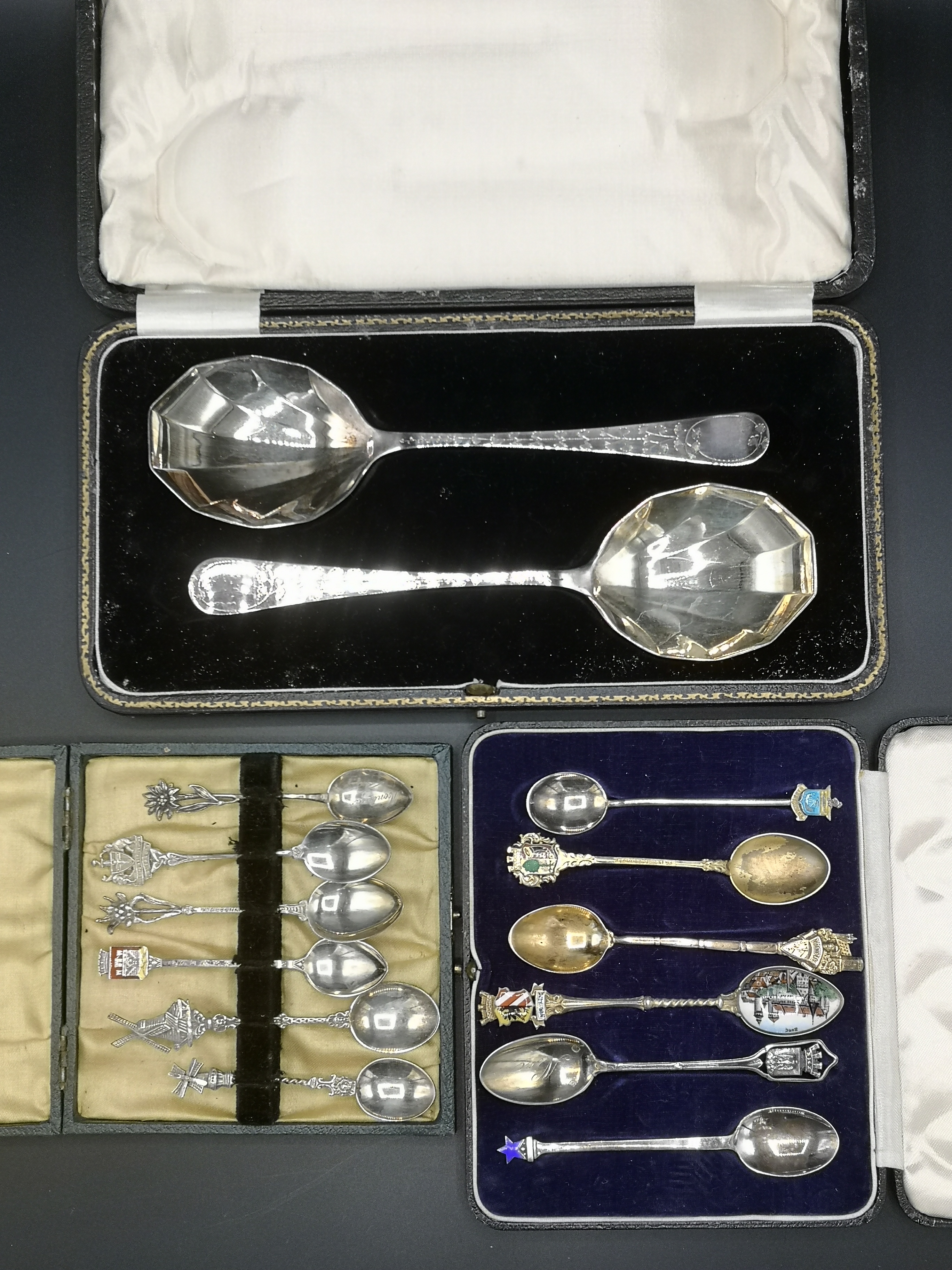 Twelve silver and white metal souvenir spoons