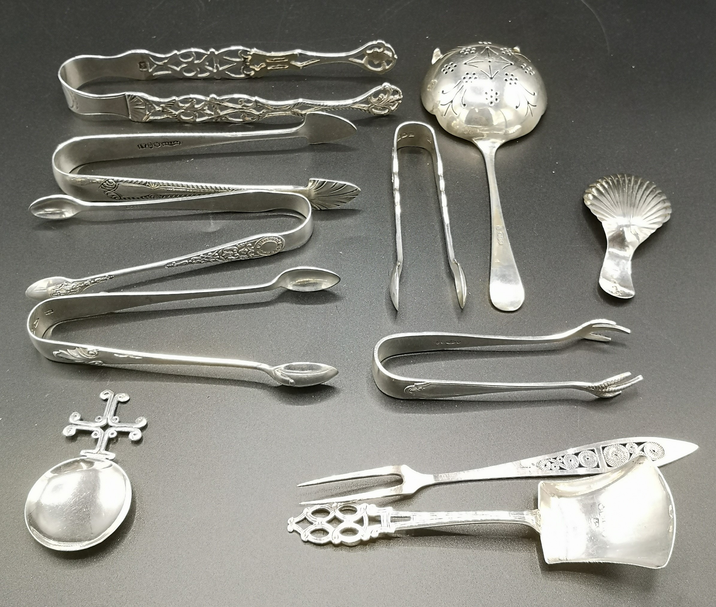 Silver tea strainer with other silver spoons together with silver plate sugar tongs - Image 10 of 10