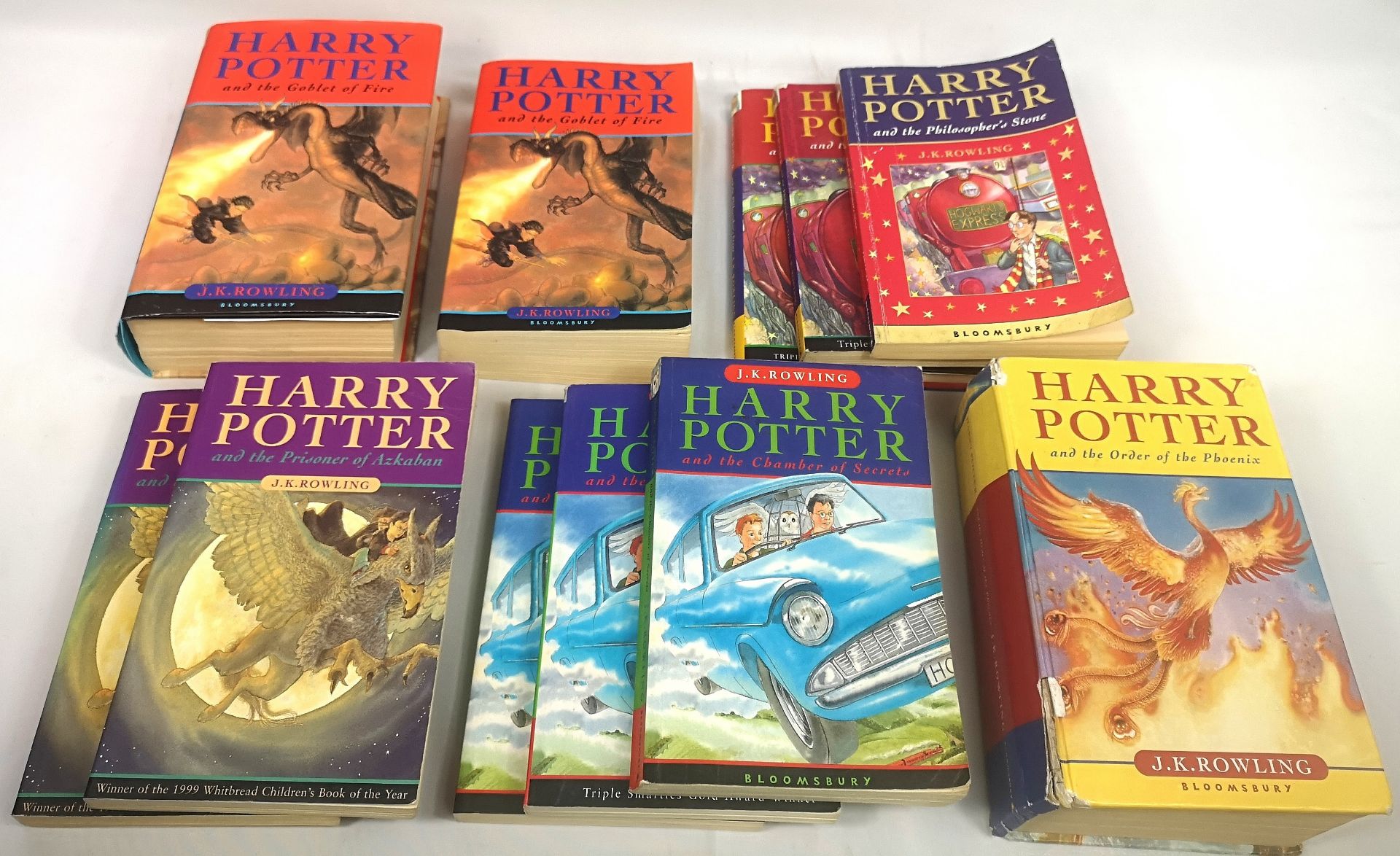 Two hardback Harry Potter books together with nine paperback Harry Potter books