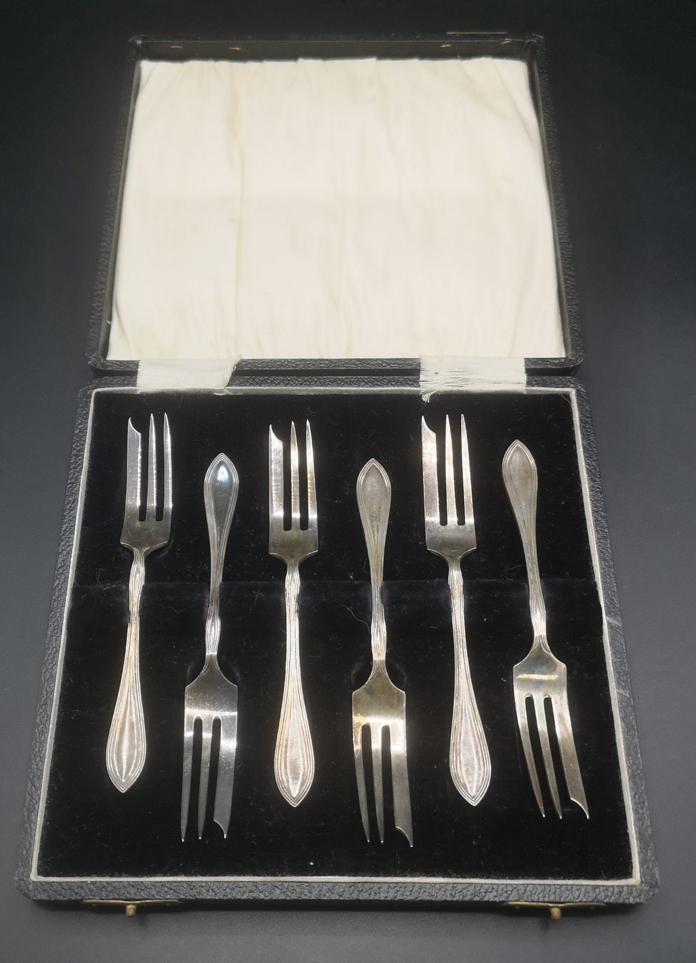 Boxed set of six silver cake forks