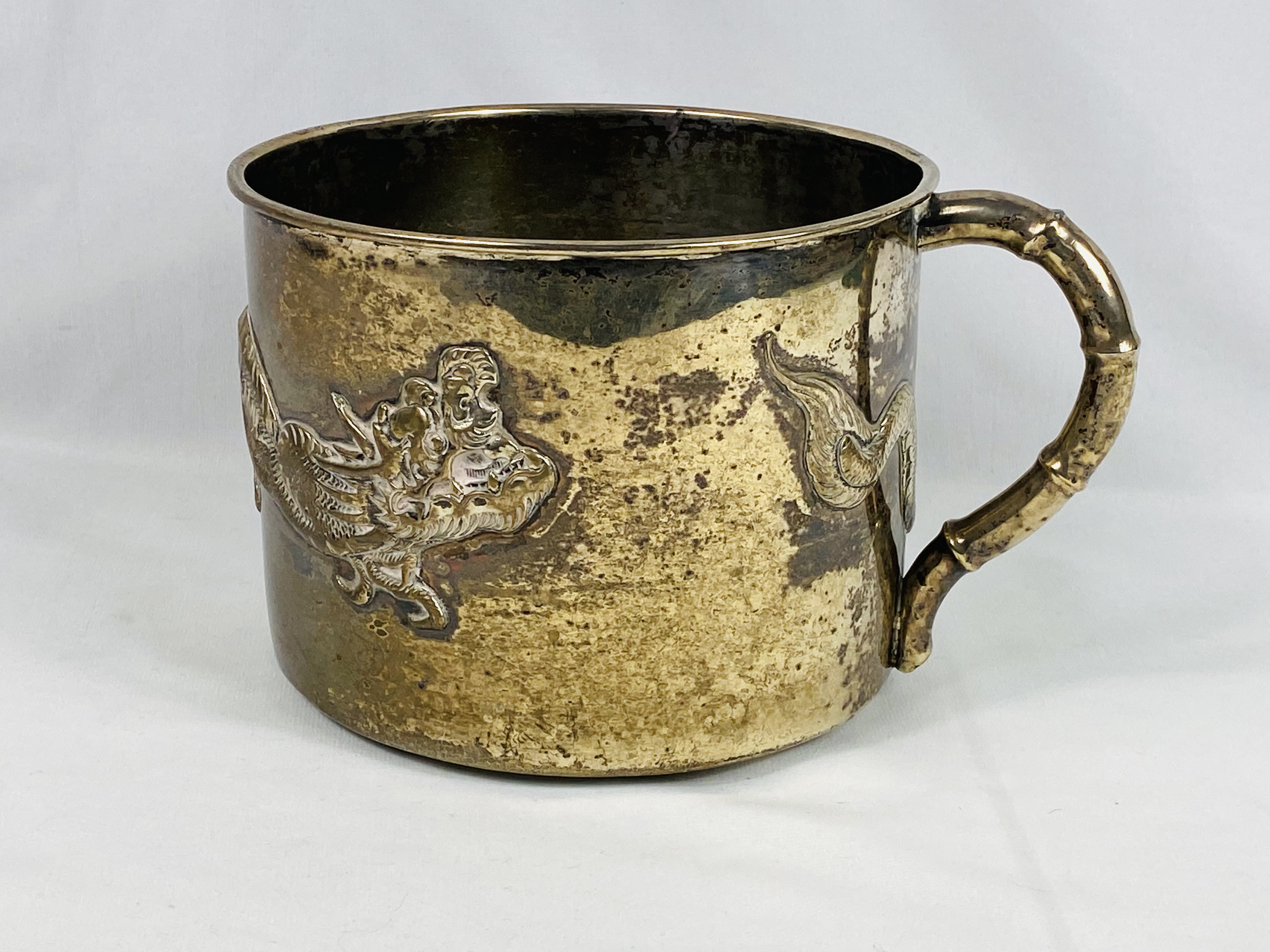 White metal mug with applied dragon