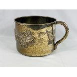 White metal mug with applied dragon