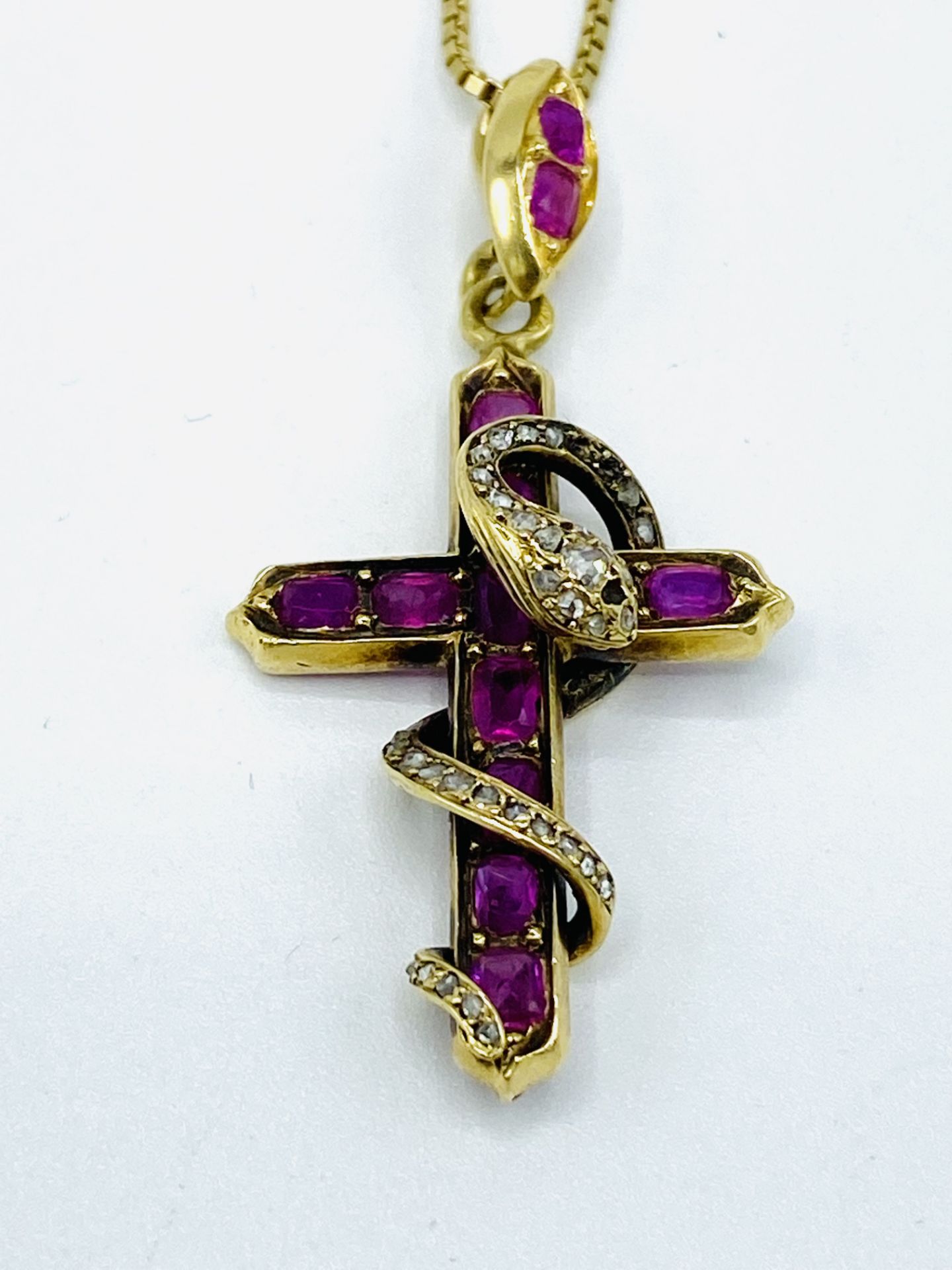 14 gold, pink sapphire and diamond pendant and chain