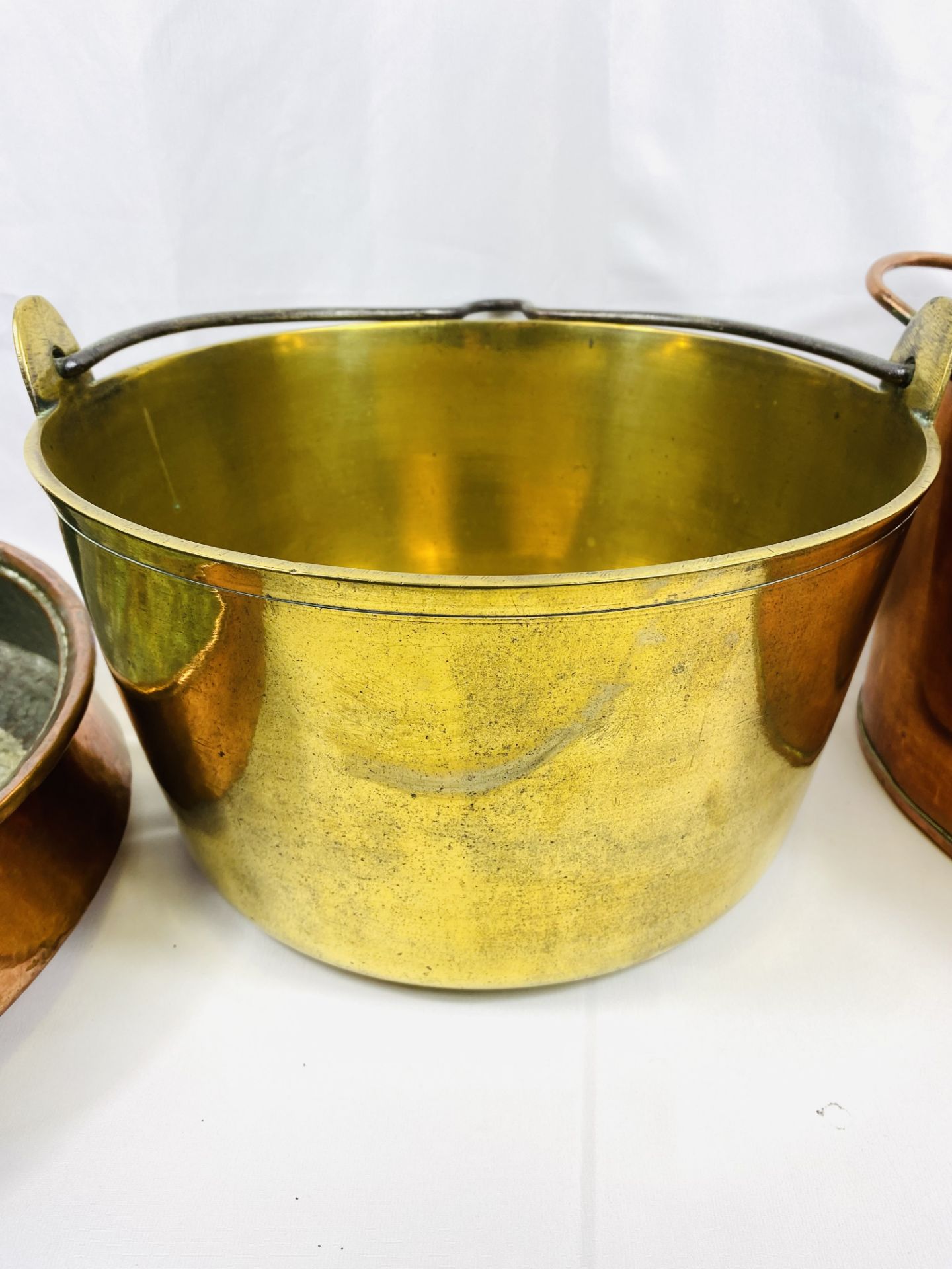 Two copper pans together with a brass jam pan - Image 3 of 4