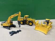 Komatsu PC210 Excavator, WA600 Loading shovel & D155AX Bulldozer