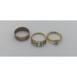 Two 18ct gold rings together with a 9ct gold ring