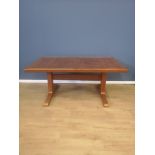 Teak extending dining table