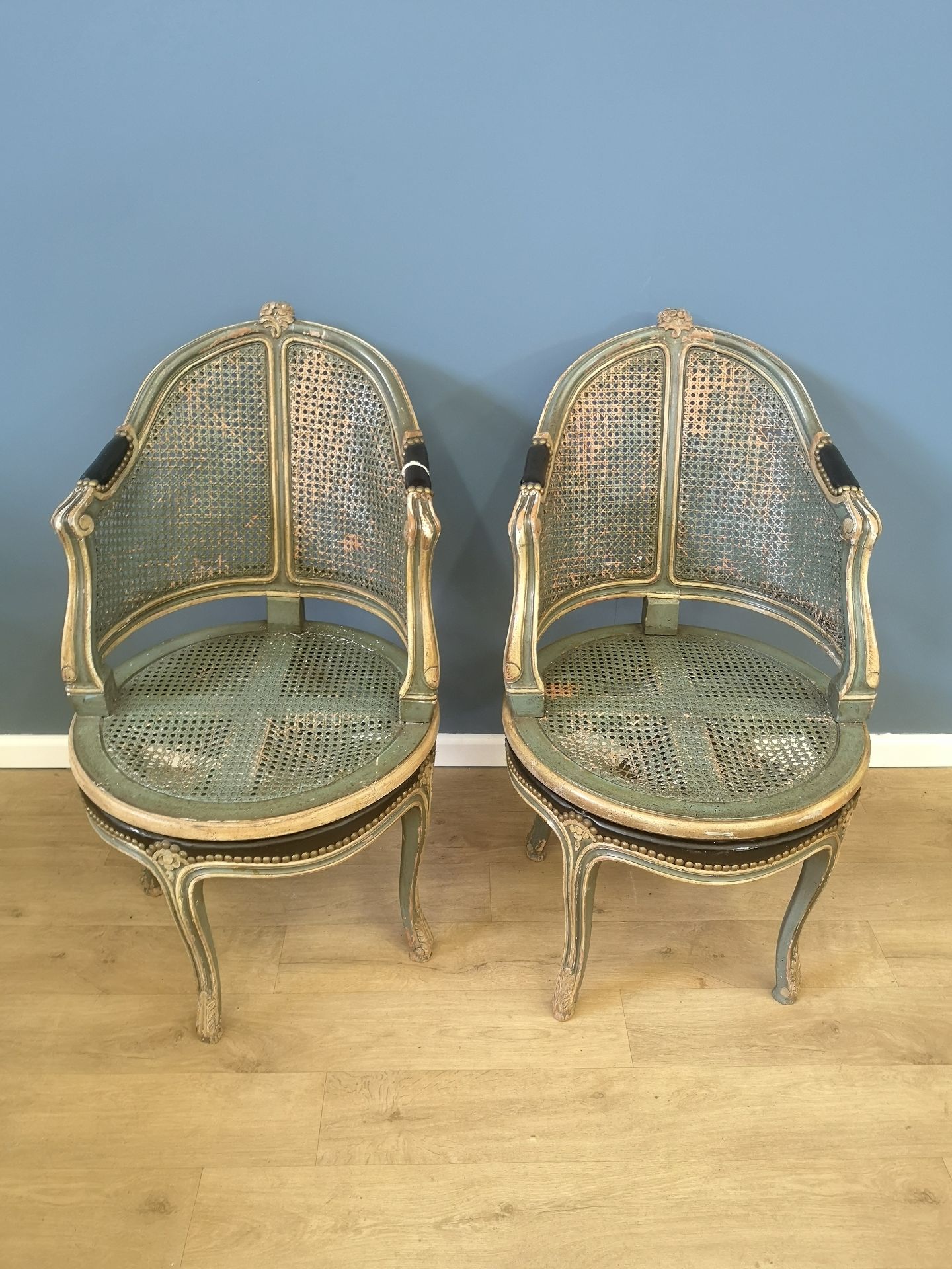 Pair of painted French Empire style elbow chairs