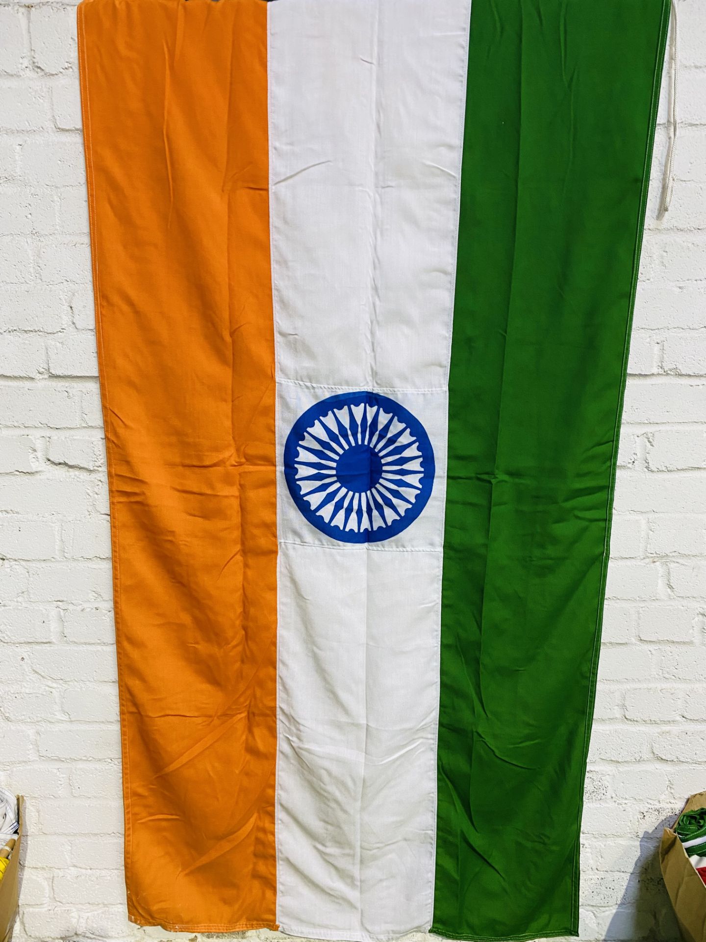 A box of fourteen flags from eight countries. This lot is subject to VAT. - Image 2 of 3