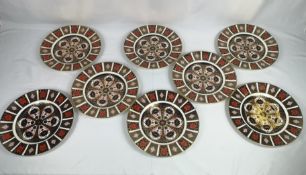 Eight Royal Crown Derby Imari pattern dinner plates