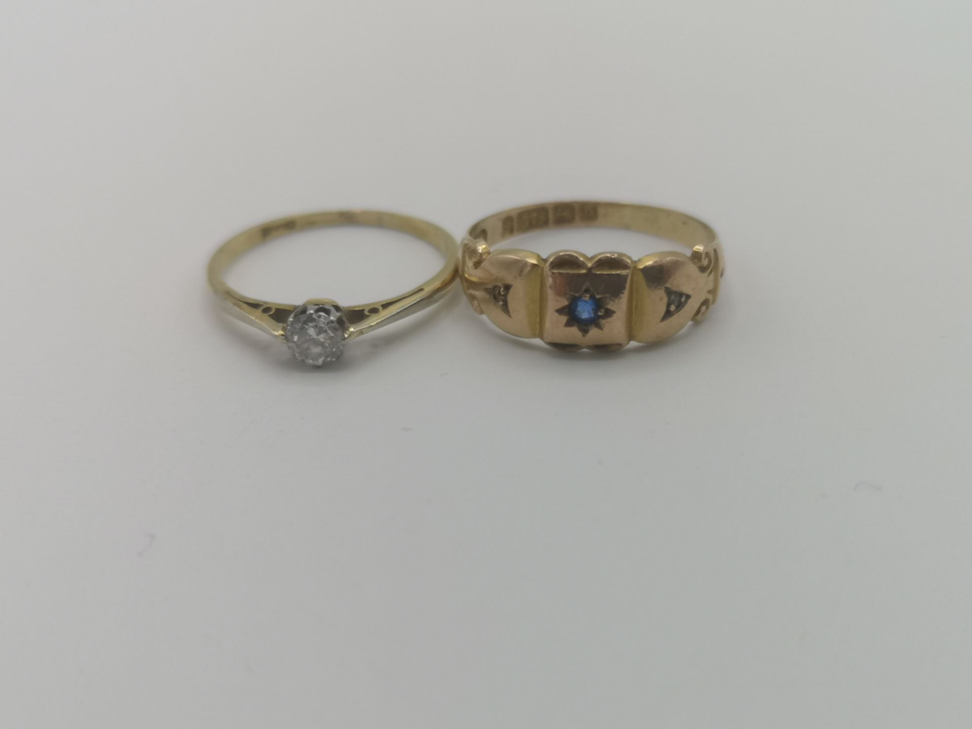 18ct gold and diamond ring together with a 9ct gold sapphire and diamond ring