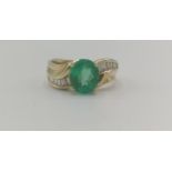 Emerald and diamond ring