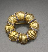 Italian 18ct gold brooch set with sapphires