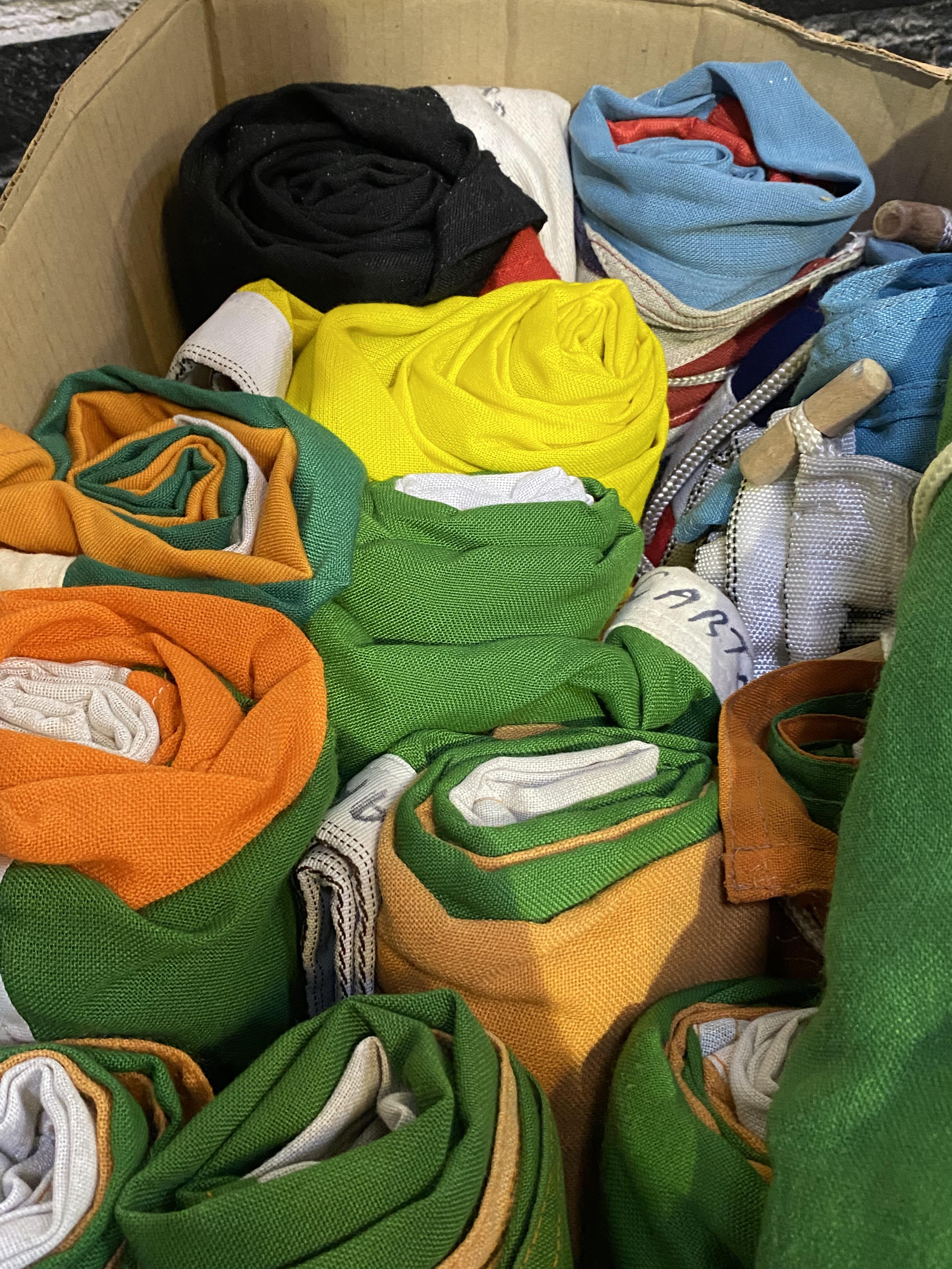 A box of sixteen flags from four countries. This lot is subject to VAT. - Image 2 of 2