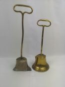 Two brass door stops