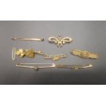 Collection of 9ct gold brooches and tie pins