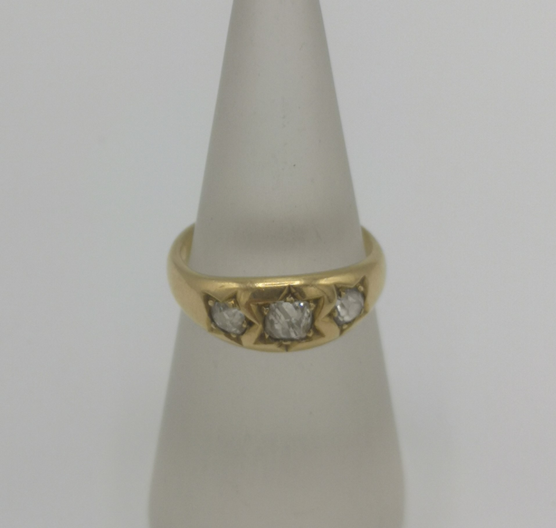 18ct gold ring set with three diamonds