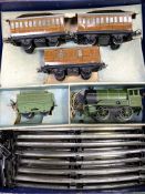 Hornby 0 gauge clockwork tinplate train, tender and carriages