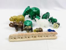 Collection of malachite and stone items