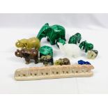 Collection of malachite and stone items