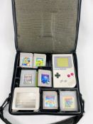 Nintendo Gameboy with games and accessories, in travel case