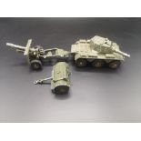 A Crescent diecast model tank together with a Dinky die-cast model missile launcher