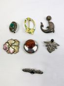 Seven silver brooches