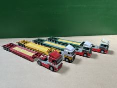 4x Volvo Tractor units in various liveries with drop neck trailers