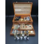 Leather jewellery box containing a quantity of costume jewellery