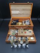 Leather jewellery box containing a quantity of costume jewellery