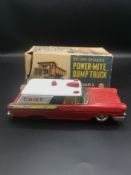 Tin plate Fire Chief car together with a Power-Mite dump truck