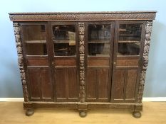 Carved oak bookcase