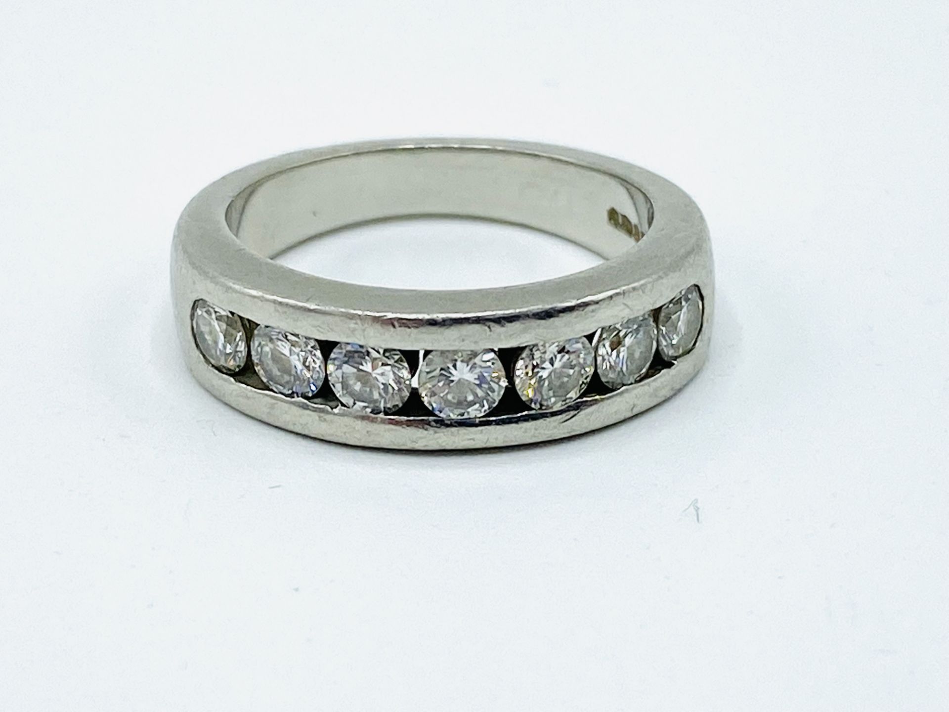 Platinum and diamond half eternity ring